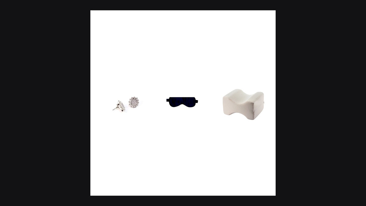 Eight Meridian Circadian Reset products — SnoozeStuds, mulberry silk sleep mask, and ergonomic knee pillow on dark editorial backdrop