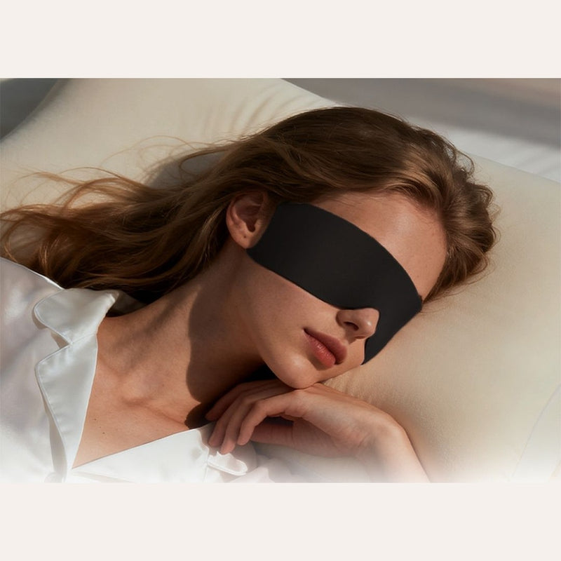 Woman side-sleeping in zero-pressure contour sleep mask — Eight Meridian