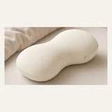 Ergonomic knee pillow for side-sleepers on white — Eight Meridian