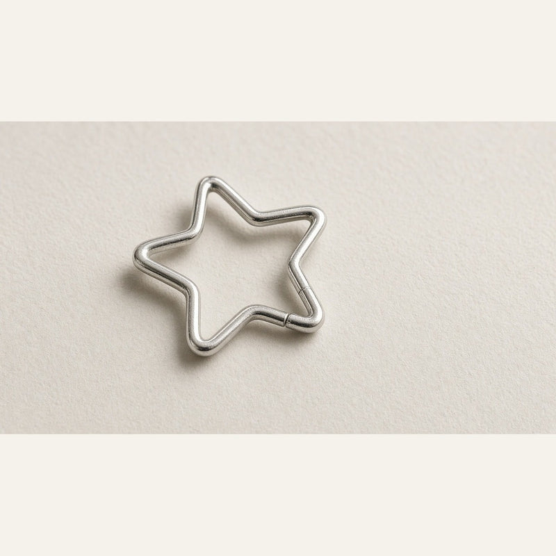 SnoozeStuds star sleep earring on off-white — Eight Meridian